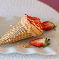 Strawberry Shortcake  · Waffle cone dipped in white chocolate covered with strawberry streusal , filled with strawbe...