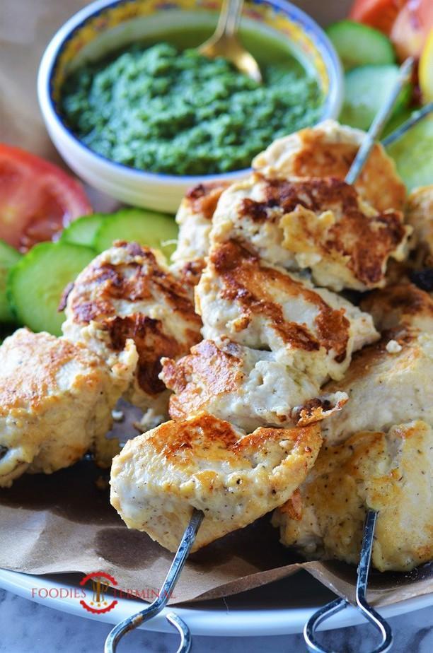 TA3. Chicken Resmi Kabab · Minced chicken seasoned with chopped ginger onions and spices rolled over a skewer and barbecued.