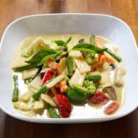 Green Curry · Thai style green curry with bamboo shoot, string beans, bell peppers and basil in coconut mi...