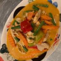 Panang Curry · Thai Panang curry with bell peppers, carrots and string beans in coconut milk. (Mild)