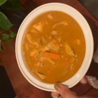 Massaman Curry · Sweet curry with potatoes, onions, carrots and peanuts in coconut milk.