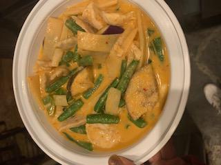 Red Curry · Thai style red curry with bamboo shoot, string beans, bell peppers and basil in coconut milk. (Med Spicy)