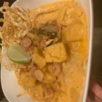 Khao Soi · Northern style curry noodle wt chicken, egg noodle, red onion, sprout, scallion,green pickle...