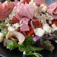 Italian Salad · Spring Mix, Ham, Turkey, Salami, Tomatoes, Red Onion, Roasted Red Peppers, and Feta Cheese. ...