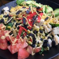 Southwest Chicken Salad · Spring mix, black bean and corn mix, tomato, avocado, tortilla strips, and cheddar cheese. S...