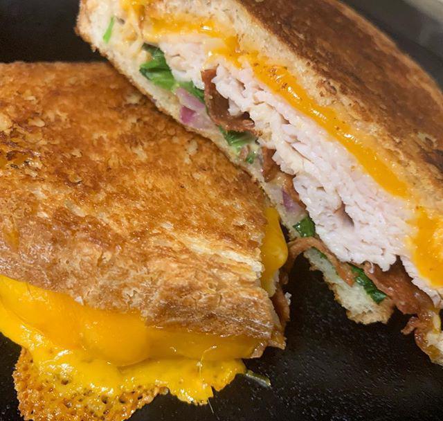Chipotle Turkey Bacon Panini · Chipotle Ranch, Turkey, Bacon, Cheddar, Red Onion, and Spinach