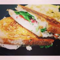 Avocado Turkey Panini · Turkey, Avocado, Roasted Red Peppers, Provolone Cheese, Spinach 

Comes with choice of side ...
