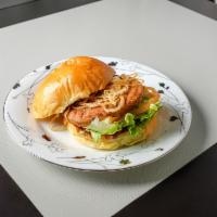 V.I.P Vegetarian Burger · A vegetarian burger on a kaiser roll filled with lettuce, tomatoes, pickles, fried onions, s...