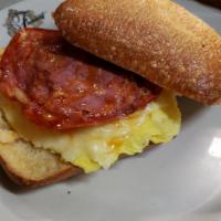 Chorizo, Egg, and Smoked Chipotle Gouda Sandwich · A Ciabatta Kaiser Roll sandwich filled with chorizo, egg, smoked chipotle Gouda cheese, and ...