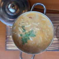 Large Tom Kha Soup · Lemongrass coconut soup with mushroom and cilantro.