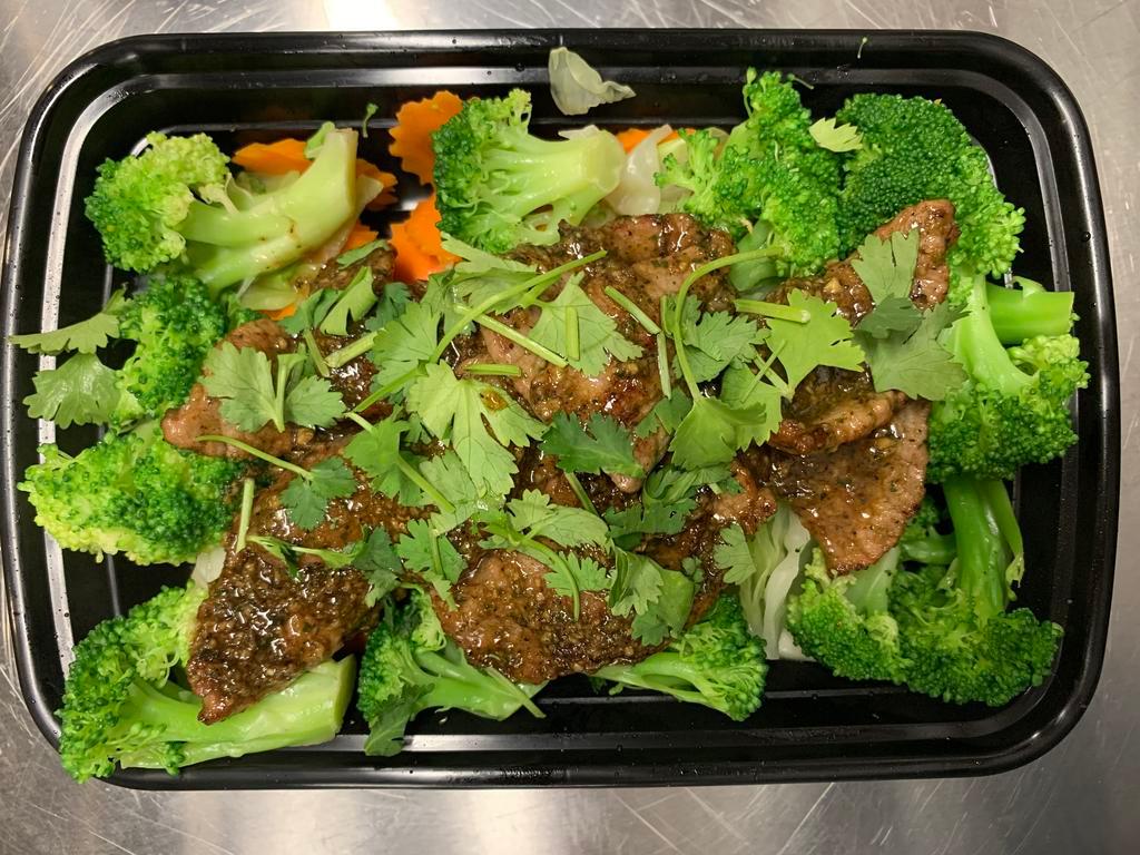 Garlic & Pepper · Sautéed meat of your choice with garlic and black pepper sauce served with steamed cabbages, carrots, and broccoli.
