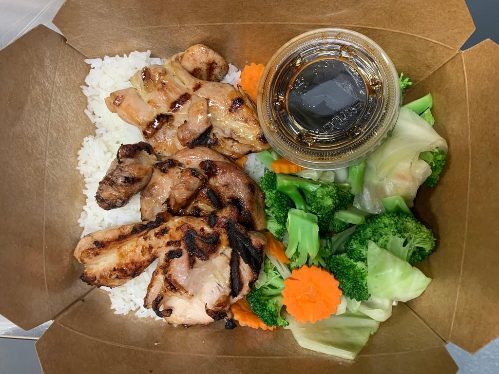 Teriyaki Chicken · Grilled marinated chicken thigh served with steamed vegetables teriyaki sauce.