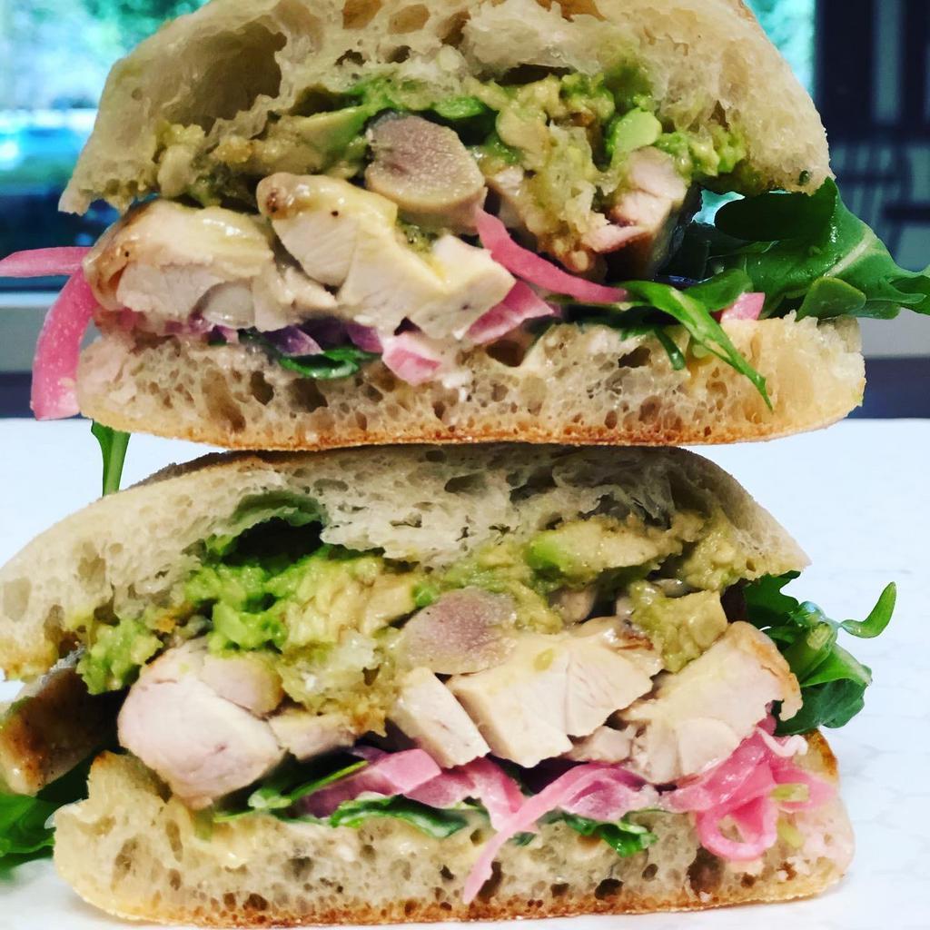 #1 - Chicken  · Chicken, NY sharp cheddar, avocado, pickled red onions and arugula served with citrus sriracha mayo on toasted pastabilities bread.