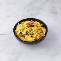 Vegetable Biryani · Basmati rice flavored with saffron and cooked with vegetables in a delicate blend of exotic ...