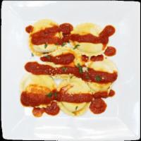 Cheese Ravioli · Cheese ravioli in tomato or marinara sauce.