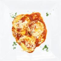 Baked Ravioli · Cheese ravioli with tomato sauce & mozzarella cheese.