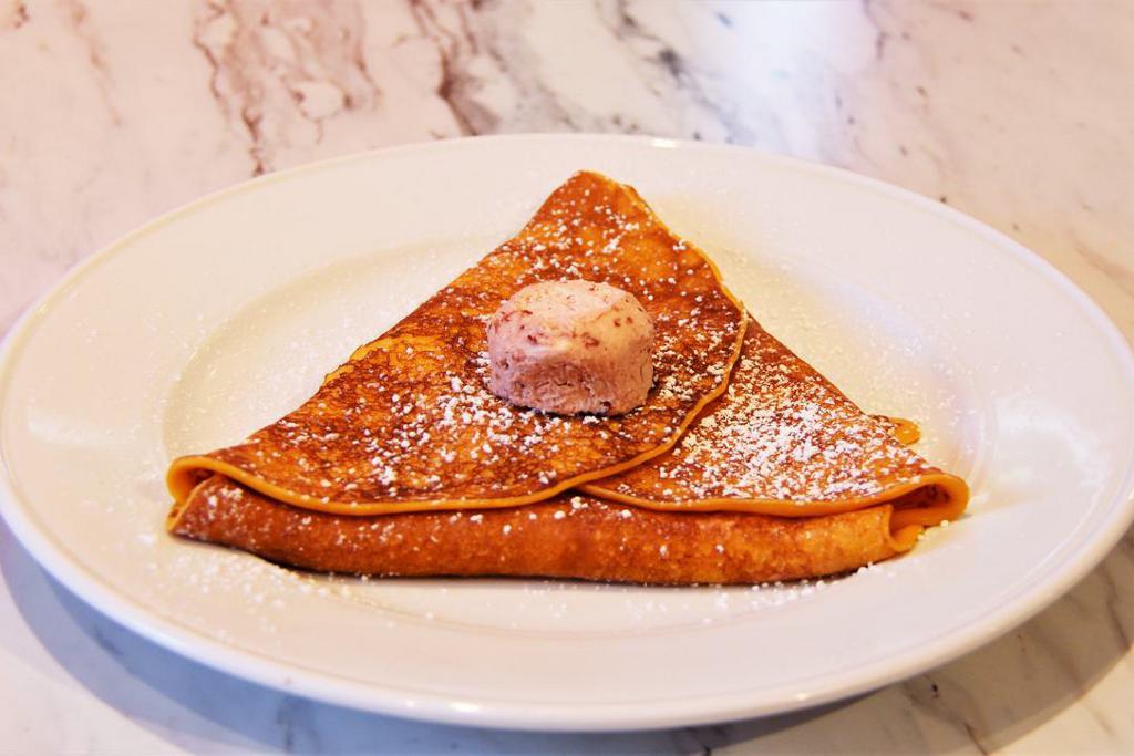 FULL STACK SWEDISH · Three Swedish crepes, powdered sugar, lingonberry butter and syrup.