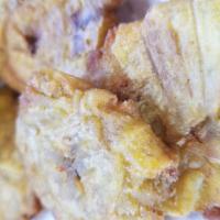 Tostones  · Plantains that have been smashed and fried 
