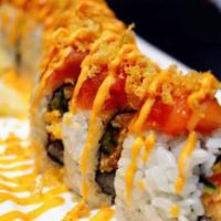 Spicy Red Dragon Roll · Avocado, cucumber and eel topped with spicy tuna and hot sauce. Raw.