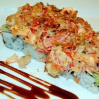 Special Volcano Roll · California roll topped with baked seafood tempura flakes and seaweed salad.