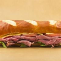 Roast Beef and American Cheese Hero · Comes with lettuce, tomato and onions.