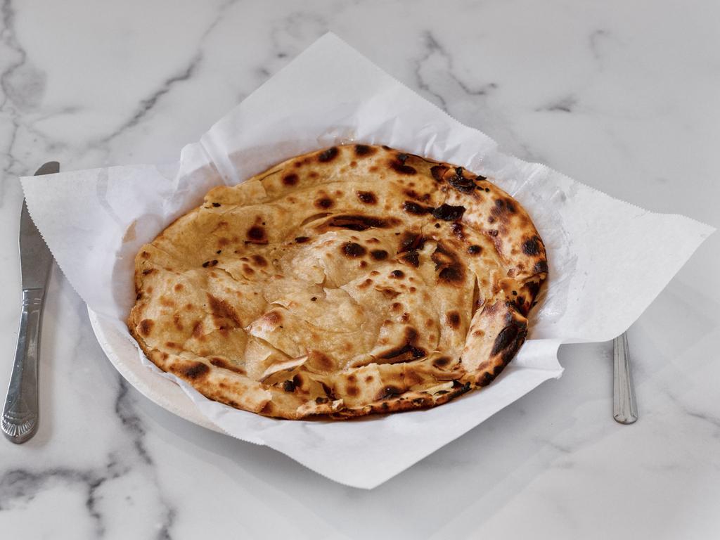 Lacha Paratha · Layered shallow indian flat bread with melted butter.crispy, flakey yet soft texture