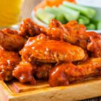 10 Piece Hot Buffalo Wings Combo · Comes with 1 side and a drink.