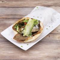 Beef and Lamb Gyro · Beef, lamb, lettuce, tomatoes, onions and cucumber sauce.