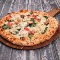 Florentine Pizza · 2 cheeses, tomato, spinach and spices.
