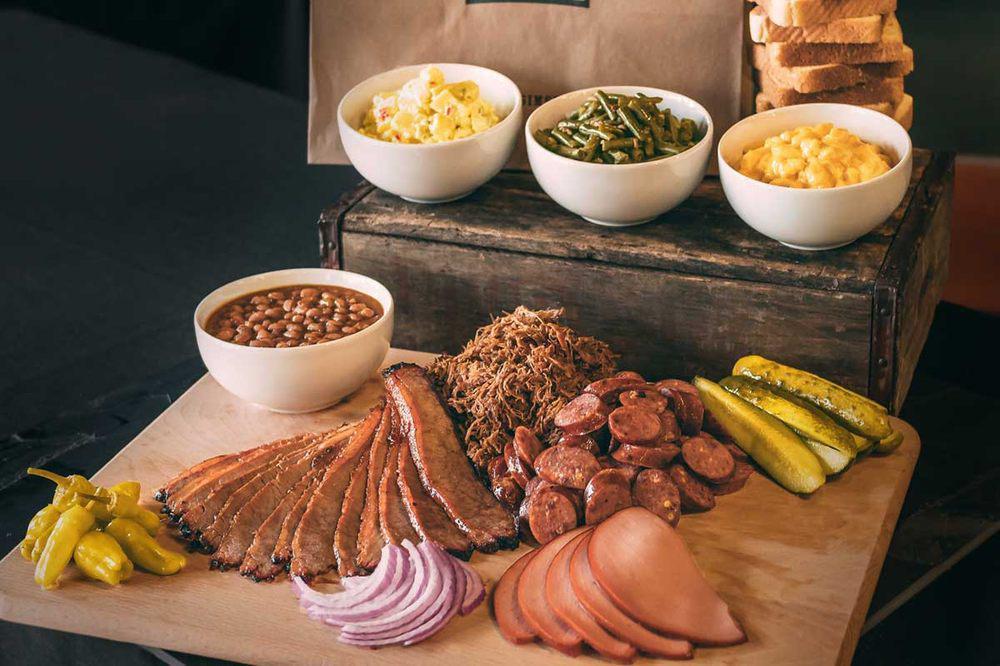Gameday Pack · Serves 3-4. 1 1/2 pound of our tasty smoked meat, 2 sides (1 pint each), and 4 slices of Texas toast. Includes pickles, peppers, onions and BBQ sauce.