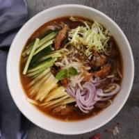 (N4) Penang Assam Laksa (亚参叻沙) · Savory soup with fish.