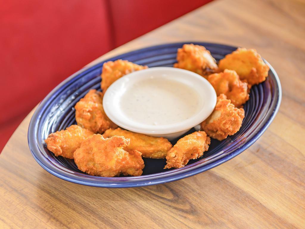 Hot Wings · 10 delicious crispy hot wings. Breaded, seasoned, and deep-fried to perfection. Served with your choice of dipping sauce.