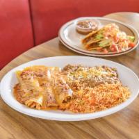 The Mexican Combo Dinner · 3 enchiladas and 2 tacos with rice and beans.
