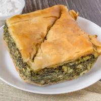 Spinach Pie · Flaky phyllo pastry filled with spinach, feta, and herbs.