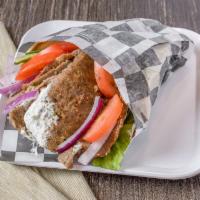 Beef Lamb Gyro Pita  · Served on a pita with lettuce, tomatoes, onions, and choice of sauce.