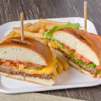 Cheese Burger Deluxe · 8 oz. Served with lettuce, tomato, and french fries.