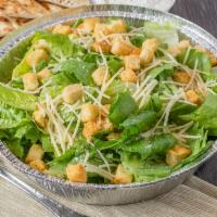 Caesar Salad · Romaine lettuce, croutons, Parmigiana cheese, and creamy Caesar dressing on the side.