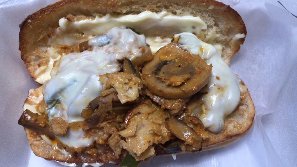 Chicken Philly with Fries · Chicken Philly Sub grilled with green pepper,onion ,mushroom mixed in a special sauce and topped with white american cheese.