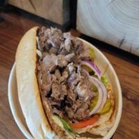 PHILLY STEAK SANDWICH · Tenderized Sliced Beef, Grilled, Served w, Lettuce, Tomato, Pickles, Red Onion, Sauce of you...