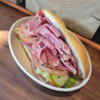 PASTRAMI SANDWICH · Grilled Pastrami Sandwich,  Served w, Lettuce, Tomato, PIckles, Red Onion, Sauce Of Your Cho...
