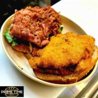 SCHNITZEL  PASTRAMI  SANDWICH · Regular Schnitzel topped with Grilled Pastrami,  served w, Lettuce, Tomato, Pickles, Onion