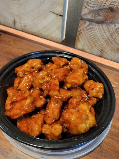 GENERAL TSO CHICKEN · Coated chicken, cut to shape, wok done w. Sweet N spicy sauce