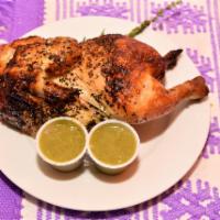 1/2 Chicken · all natural Half Rotisserie Chicken seasoned and served with green tomatillo sauce 