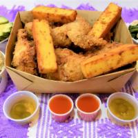 8 Pieces Chicken Combo 4 Sides · all natural 8 pieces Crispy Fried Chicken served with jalapeno vinegar and hot sauce and Fou...