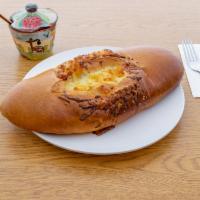 Loaf of Cheese bread · Pan con queso.