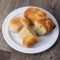 Garlic Knots · 5 pieces. Rolled baked garlic bread. 