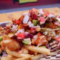 Dirty Fries · A big pile of crispy fries loaded with avocado, bacon, special sauce, NM green chile, red on...