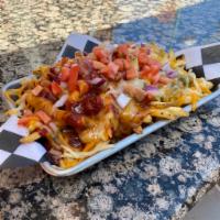 Chile Cheese Fries · Housemade NM green or red chile sauce and cheddar cheese. Topped with red onion and diced to...