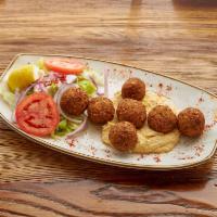 7 Piece Falafel with Hummus · Lightly fried vegetable balls made of chickpeas with celery, garlic, parsley and cilantro se...