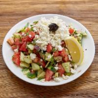 Shepherd's Salad · Fresh tomatoes, Kirby, green peppers, onions, parsley, olive oil and lemon juice.